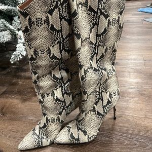 Women’s heeled snakeskin boots